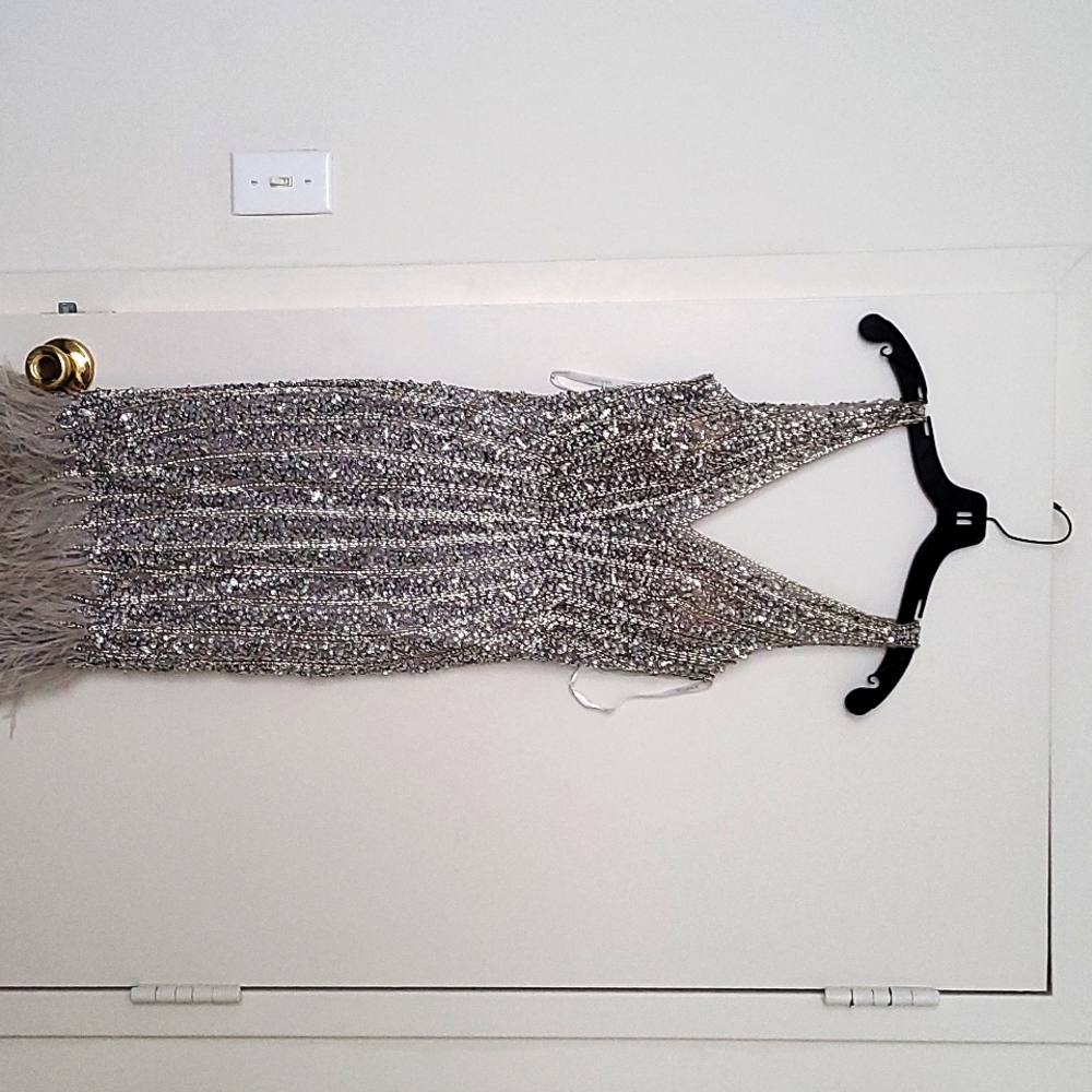 Beaded silver Jovani feather gown